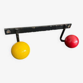 Wall coat rack with vintage colored balls
