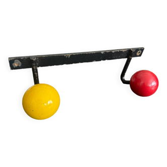Wall coat rack with vintage colored balls