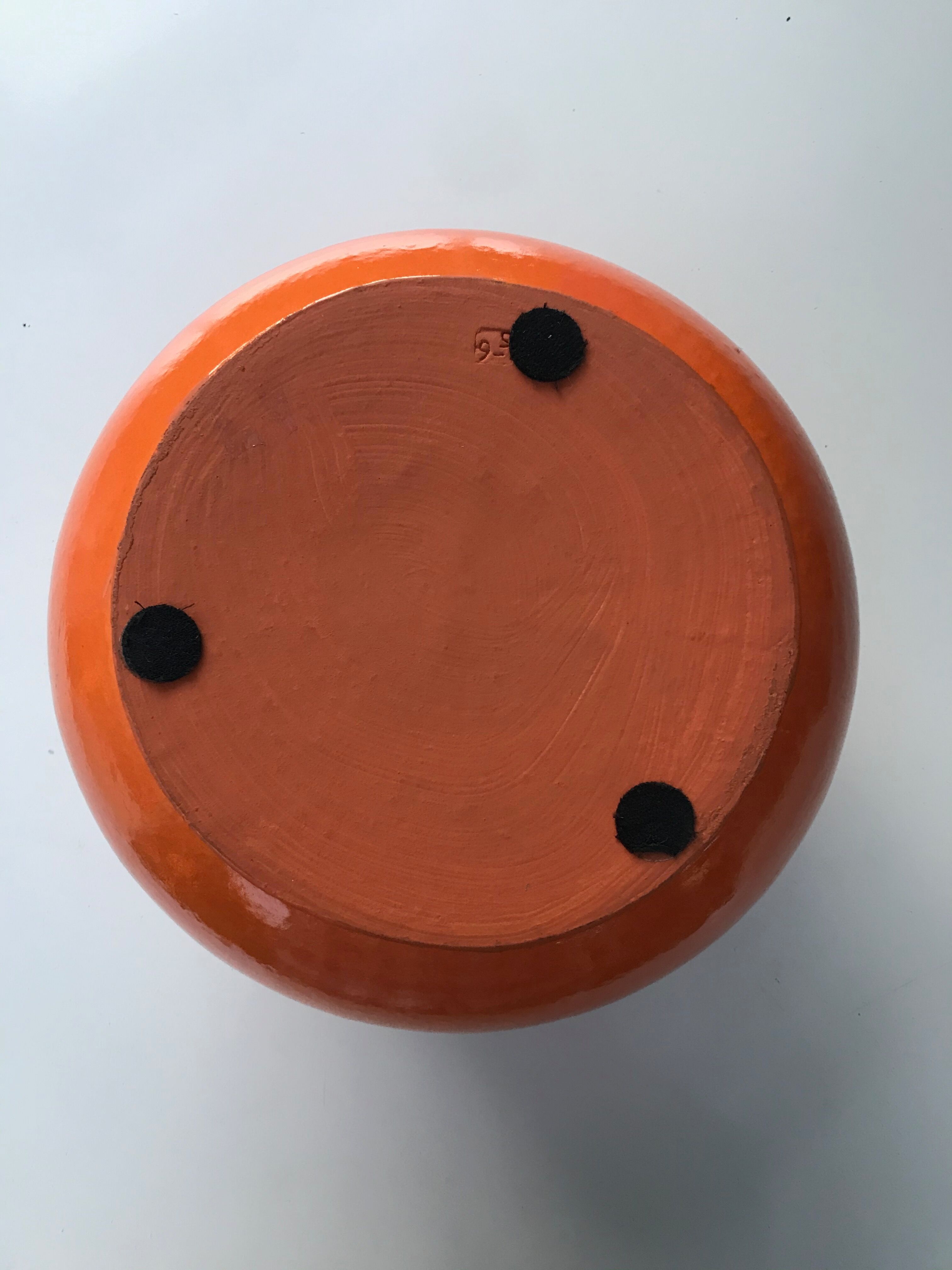 Orange terracotta vase