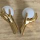 Pair of Arlus hand sconces