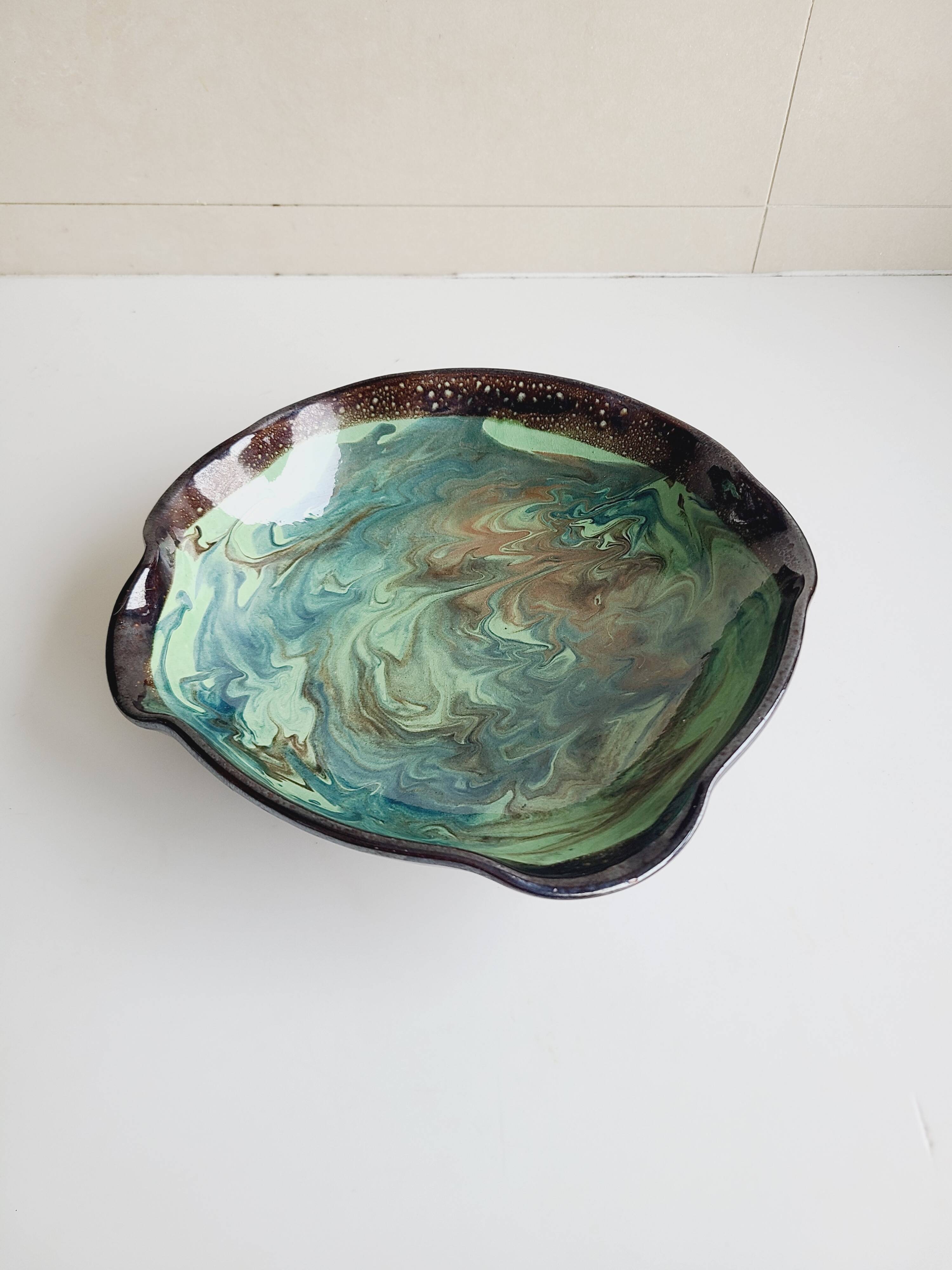 Handmade ceramic pocket emptier