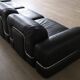 Modular sofa in black leather by Rodolfo Bonetto for Tecnosalotto, 1960s
