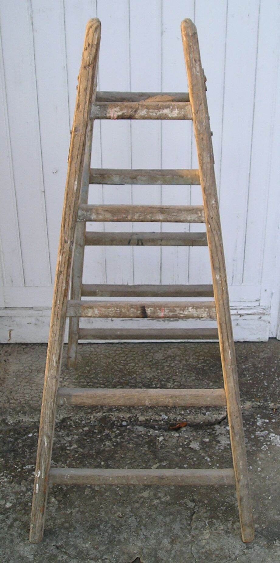 Old wooden painter ladder