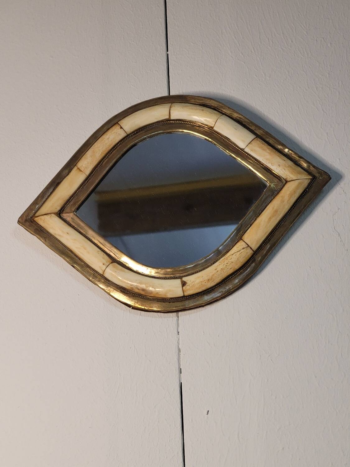 Brass and bone mirror