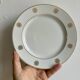 Set of 10 vintage white and gold dessert plates.