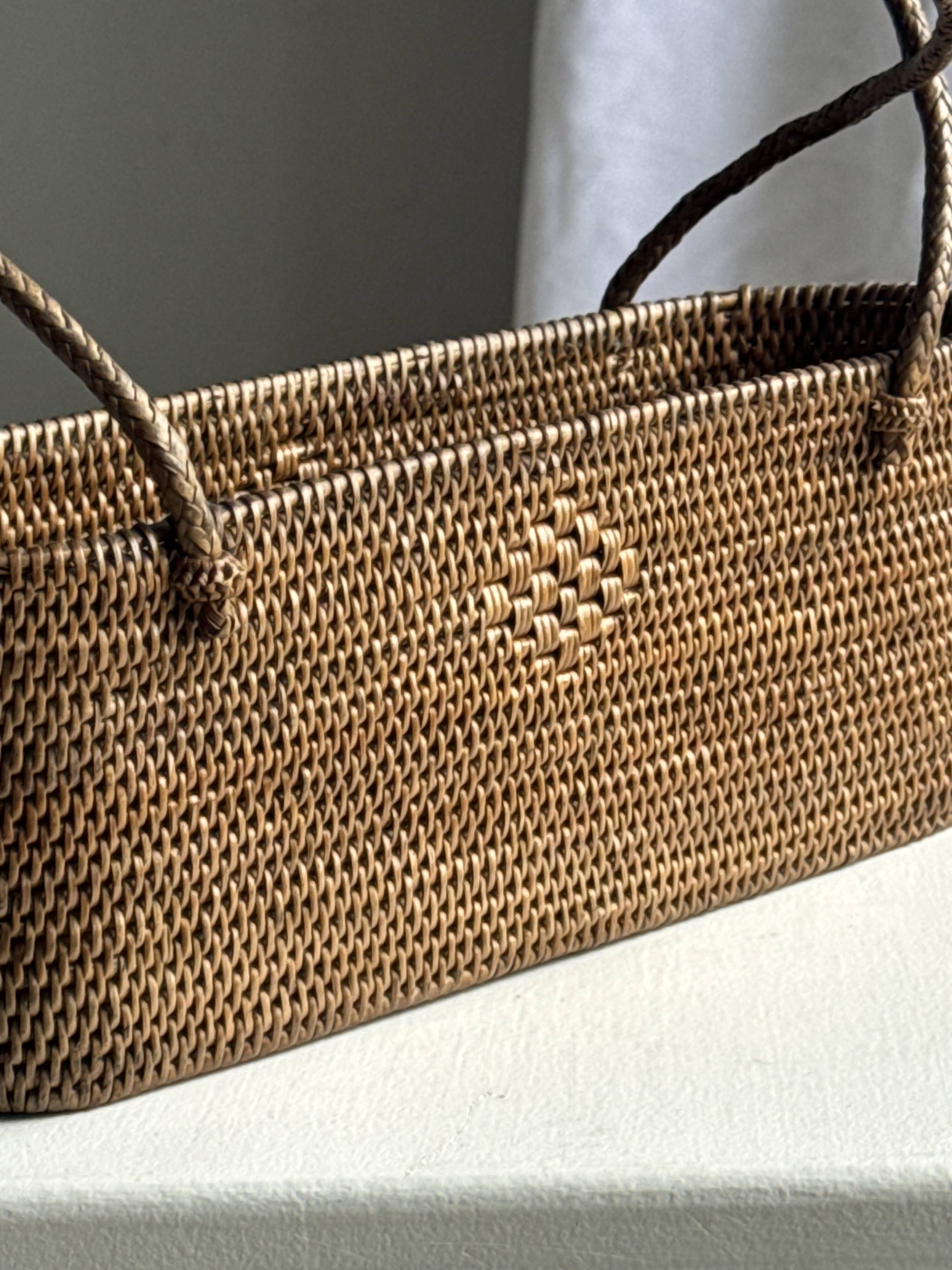 Small oval basket with long handles, traditional Indonesian L28xH10