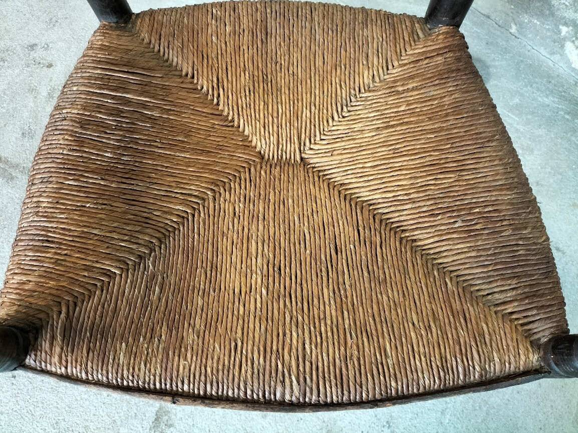 High back straw armchair