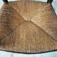 High back straw armchair
