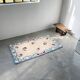 Tapis en laine blanc et bleu fleuri