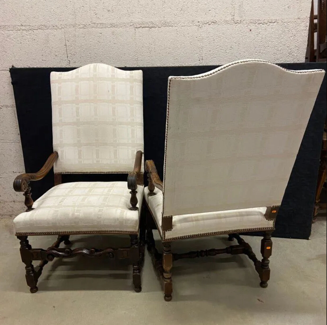 Pair of Louis XIII style molded wood armchairs