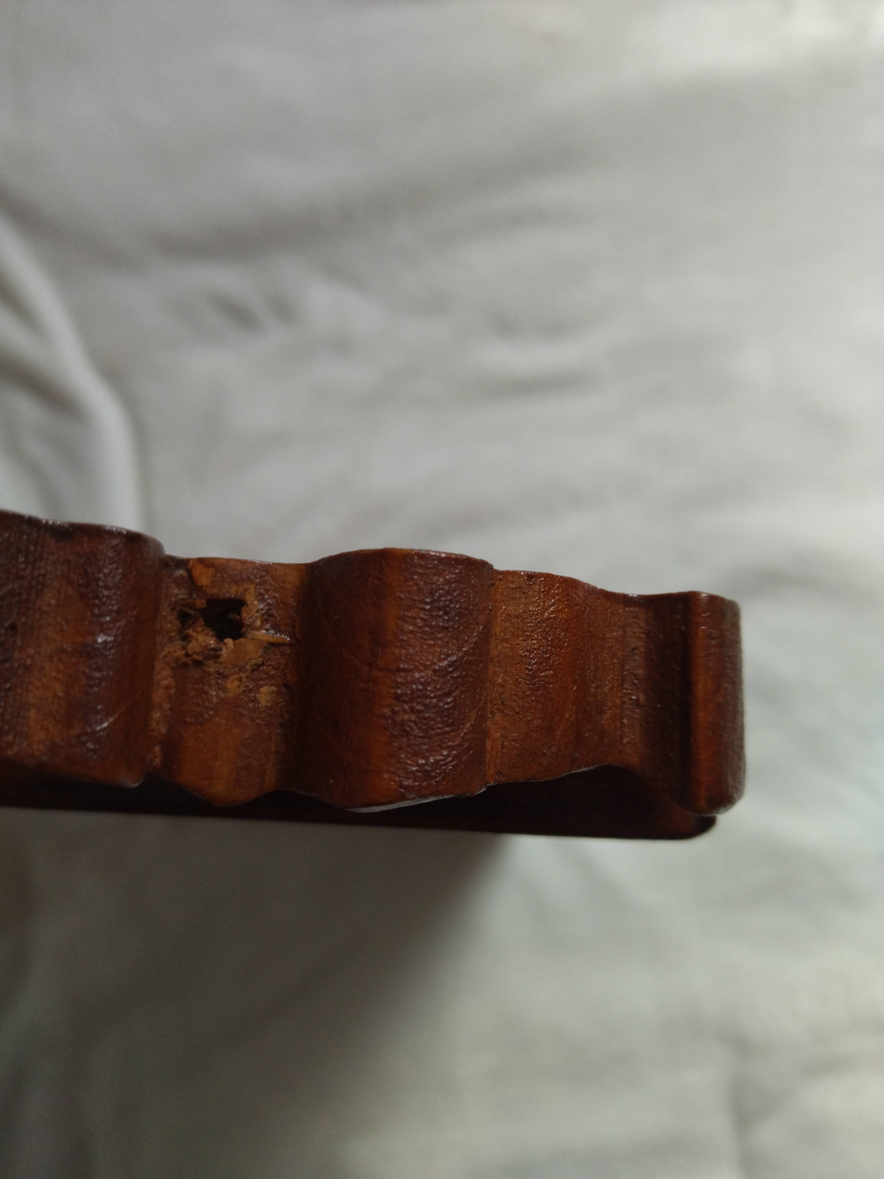 Wooden hanging mirror with vintage carved knot
