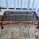 Table basse maugrion bambou, verre et cuir