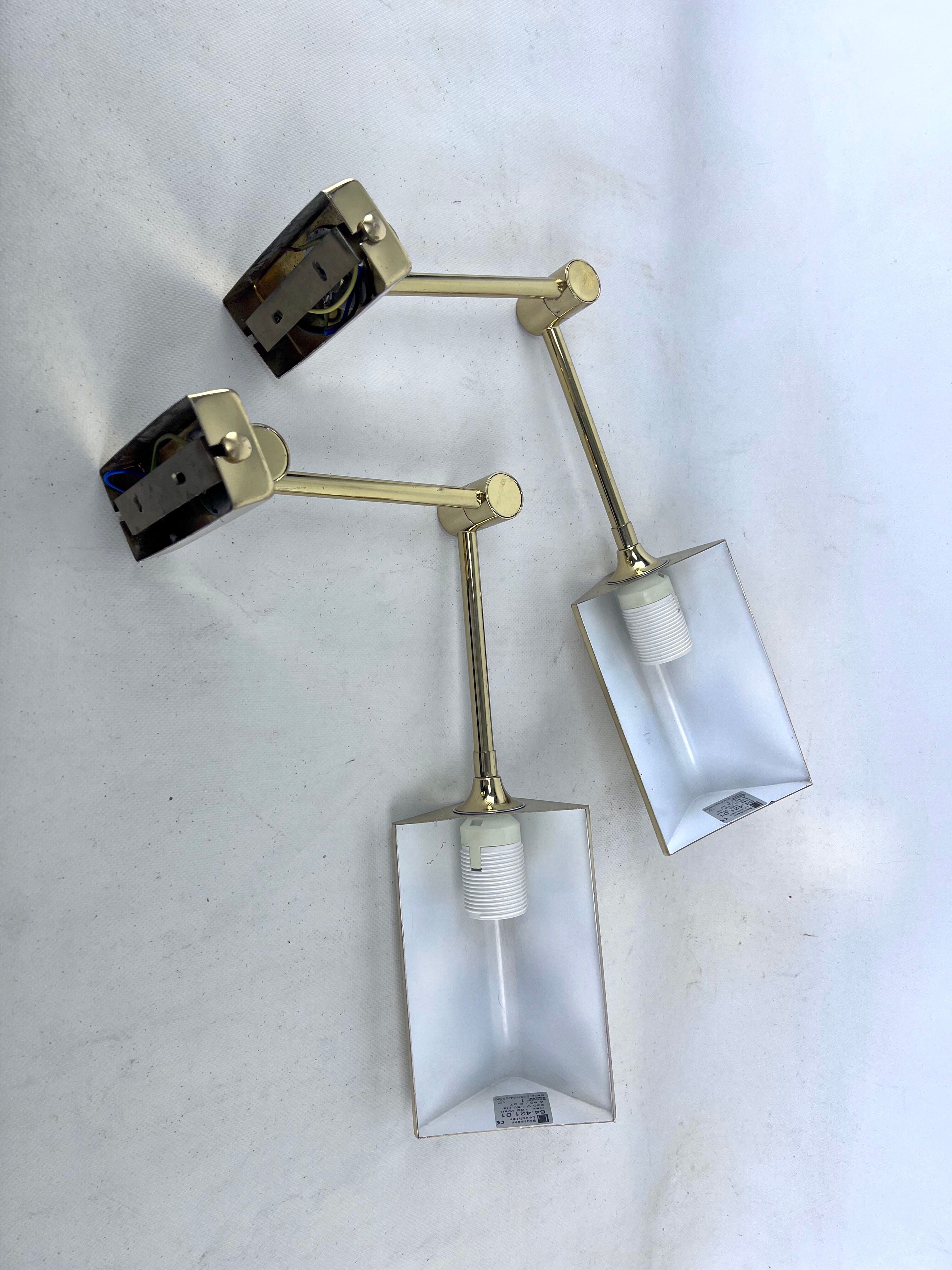 Postmodern pair of articulated brass wall lamps by Baulmann Leuchten. Germany 1980s