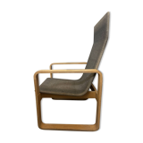 Armchair in curved wood and gray fabric
