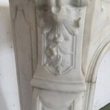 Cheminée de style Louis XV en marbre blanc de Carrare XIX siècle