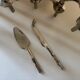 Golden metal cheese cutlery imitating bamboo