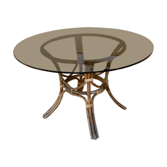Round table.1970. Rattan and smoked glass. 120cm.