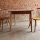 Together two Scandinavian chairs and its wooden and formica table
