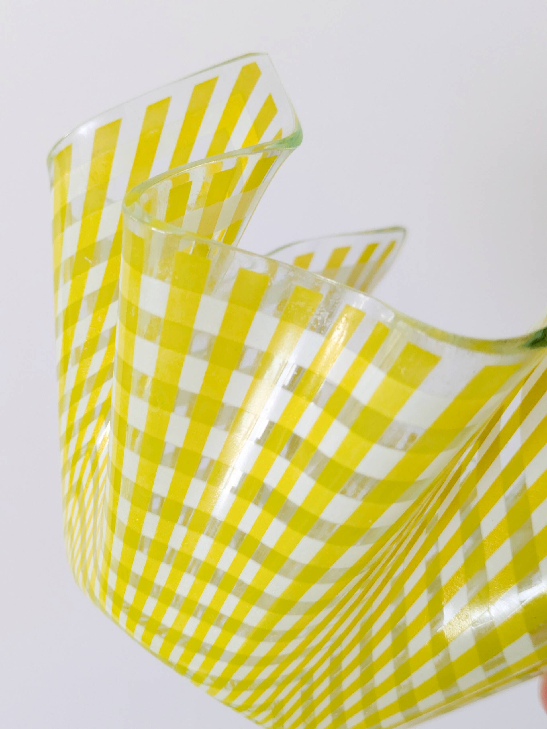 Pair of "Gingham" Chance Brothers cups with yellow checkered pattern and wavy edges.