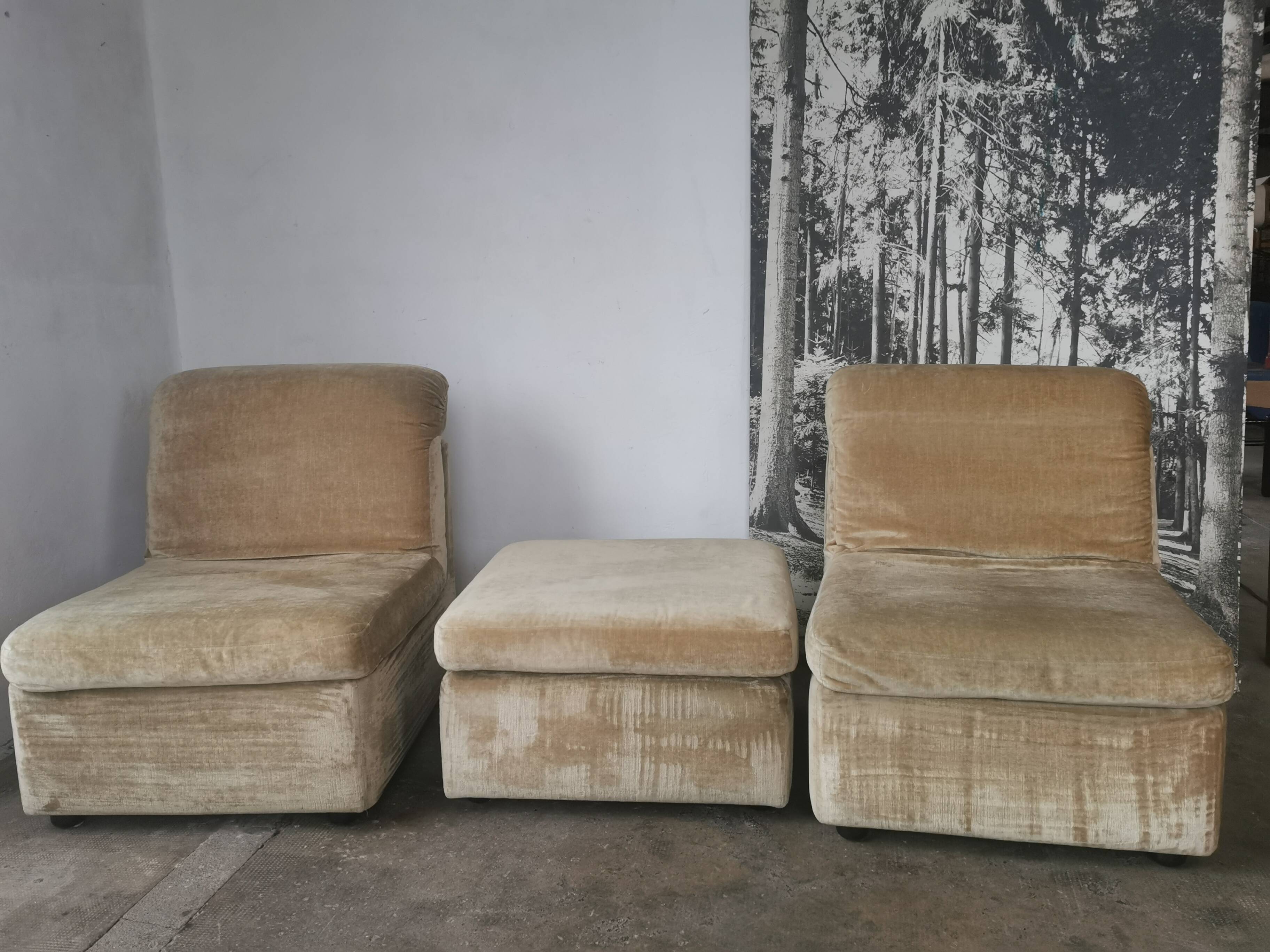 Pair of modular velvet armchairs and ottoman