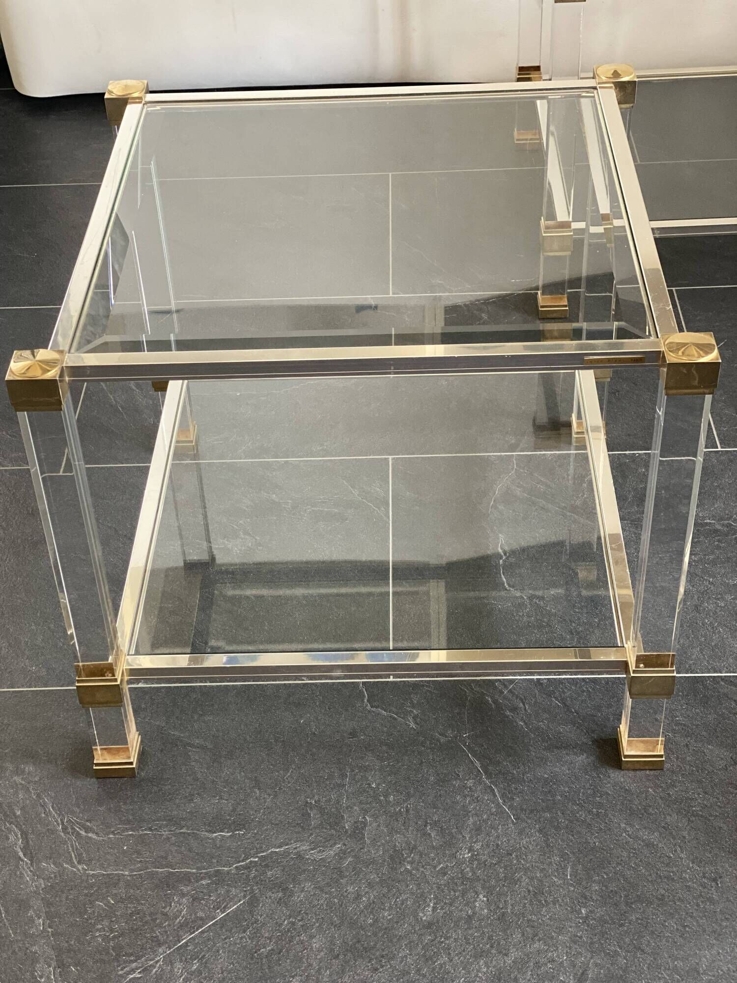 Pair of vintage and brass glass hollywood regency side tables by peter vandel