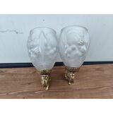 Pair of brass wall lights and glass paste.