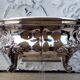 Antique silver-plated metal tealight with vine branch decoration