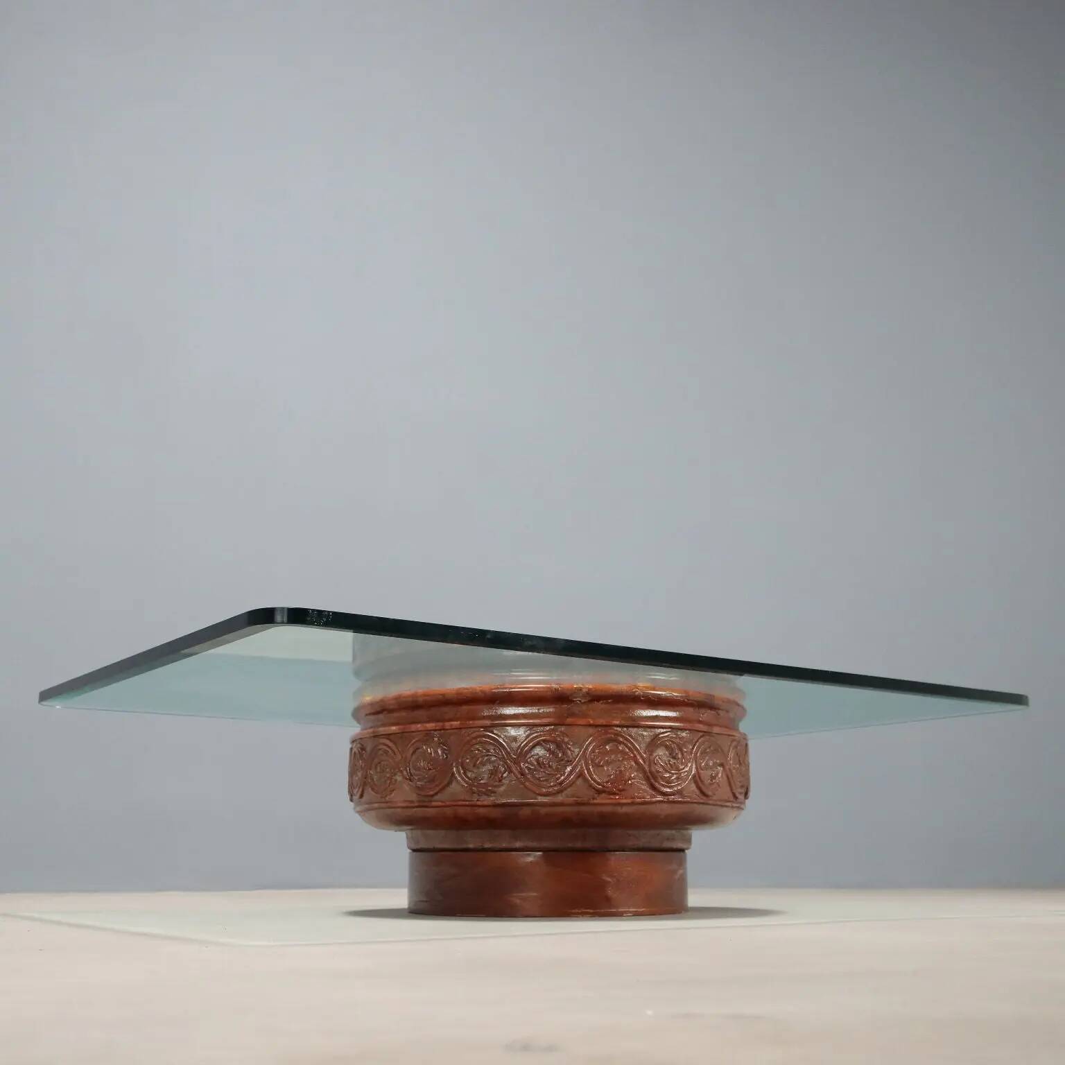 Vintage coffee table with a glass top and a terracotta base, 20th century.