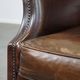 Vintage sheepskin armchair in a dark cognac colour with a comfortable seat