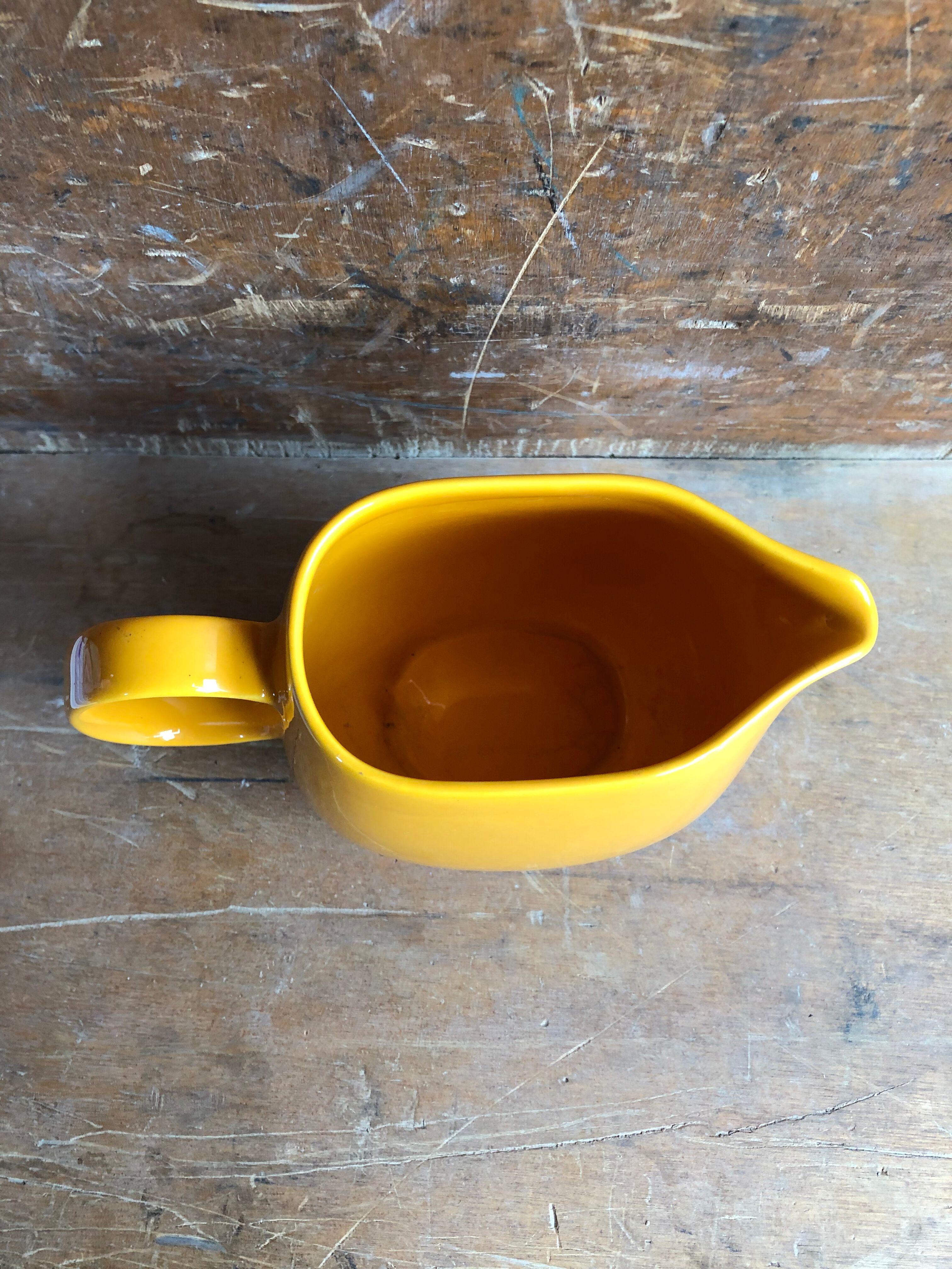 Old yellow ceramic pitcher made in germany 70s vintage