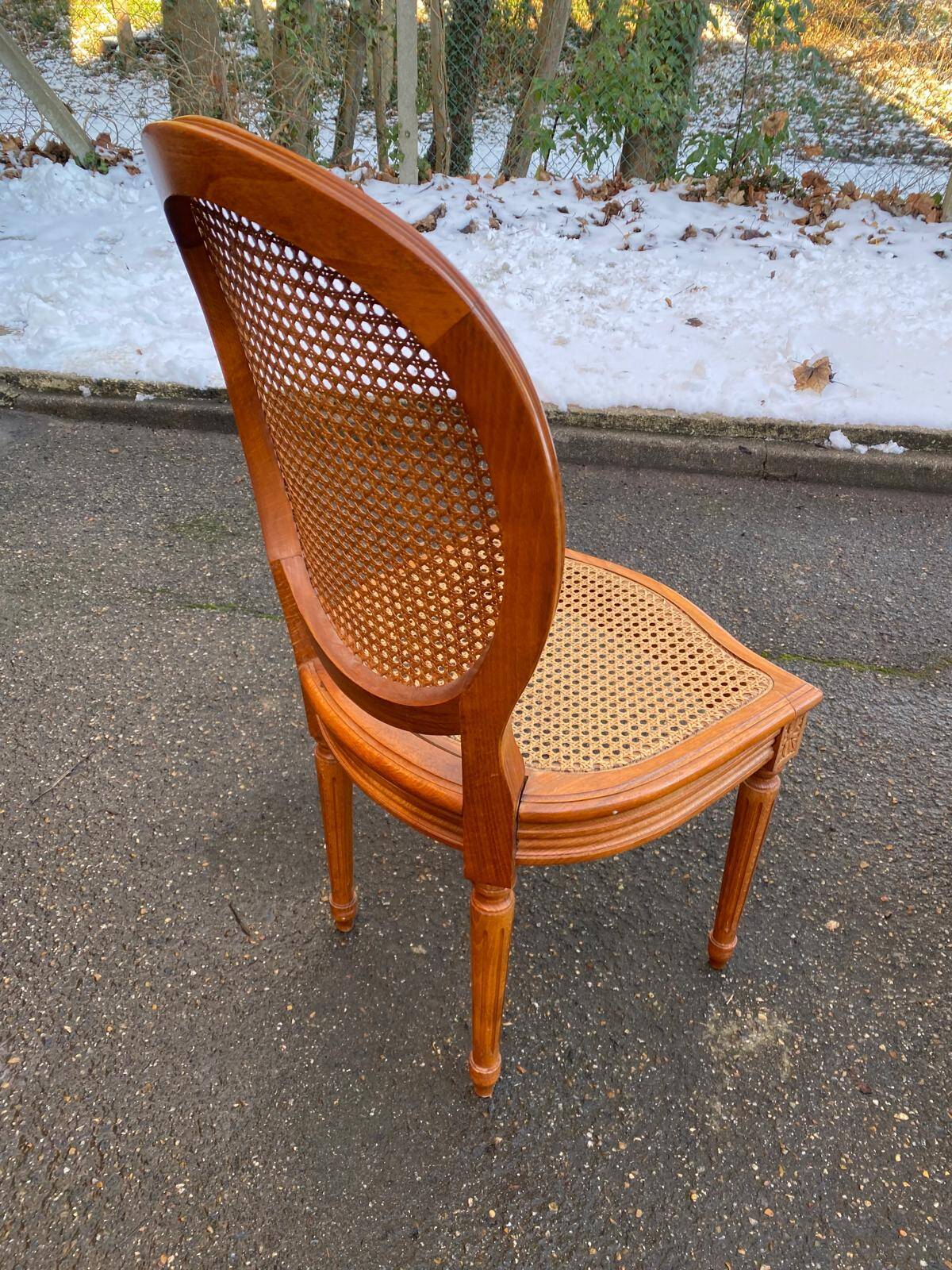 4 caned Louis XVI medallion dining chairs from the 19th century.