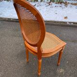 4 caned Louis XVI medallion dining chairs from the 19th century.