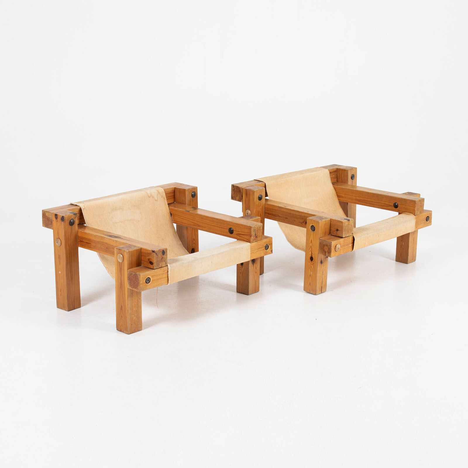 Pair of brutalist chairs in pine and canvas, 1970s
