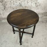 Vintage gueridon with beaded wooden legs.