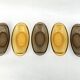 Set of 5 small oval eared dishes in amber and smoked tempered glass