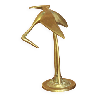 Brass heron statue