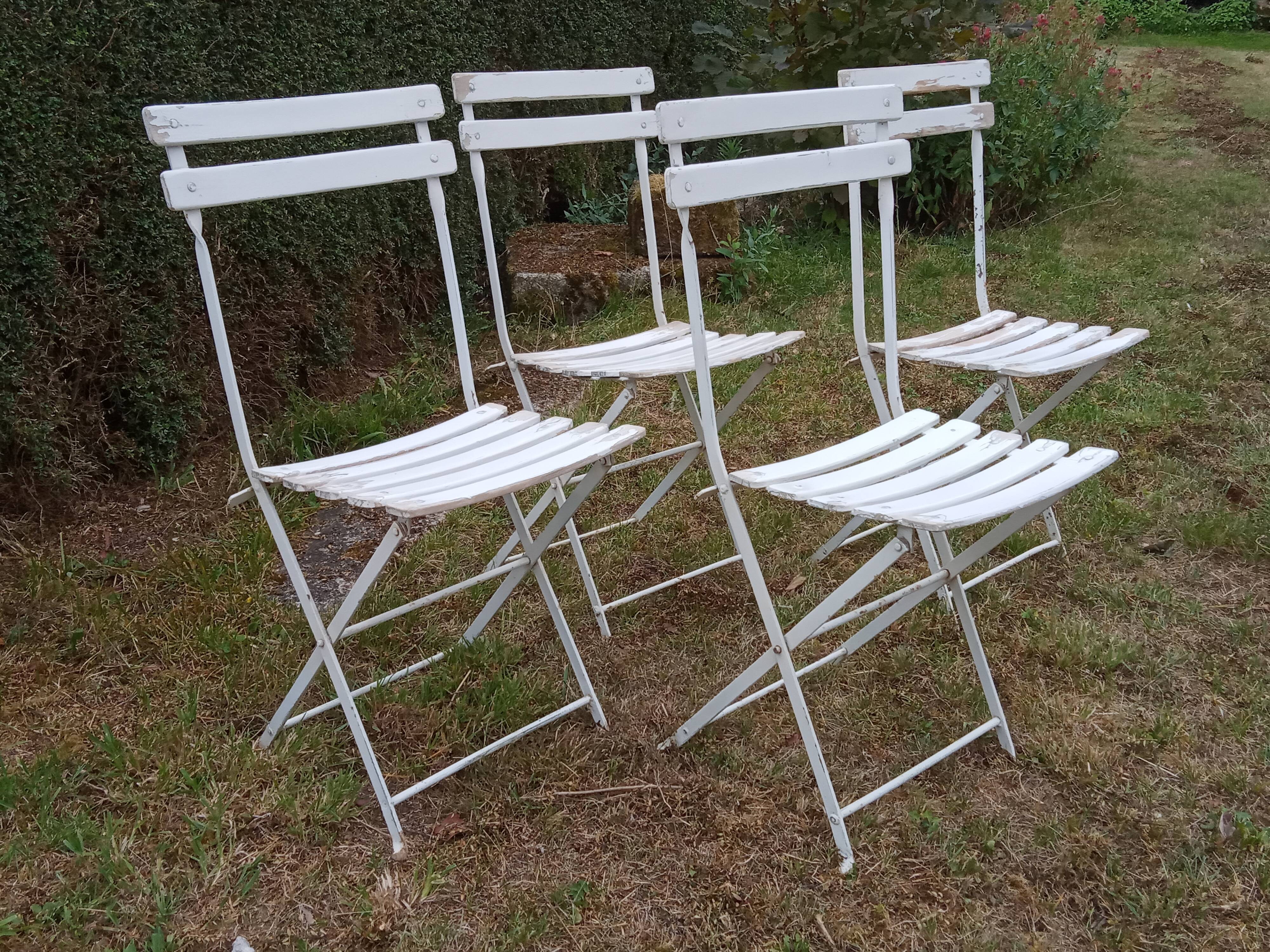 Four old garden chairs