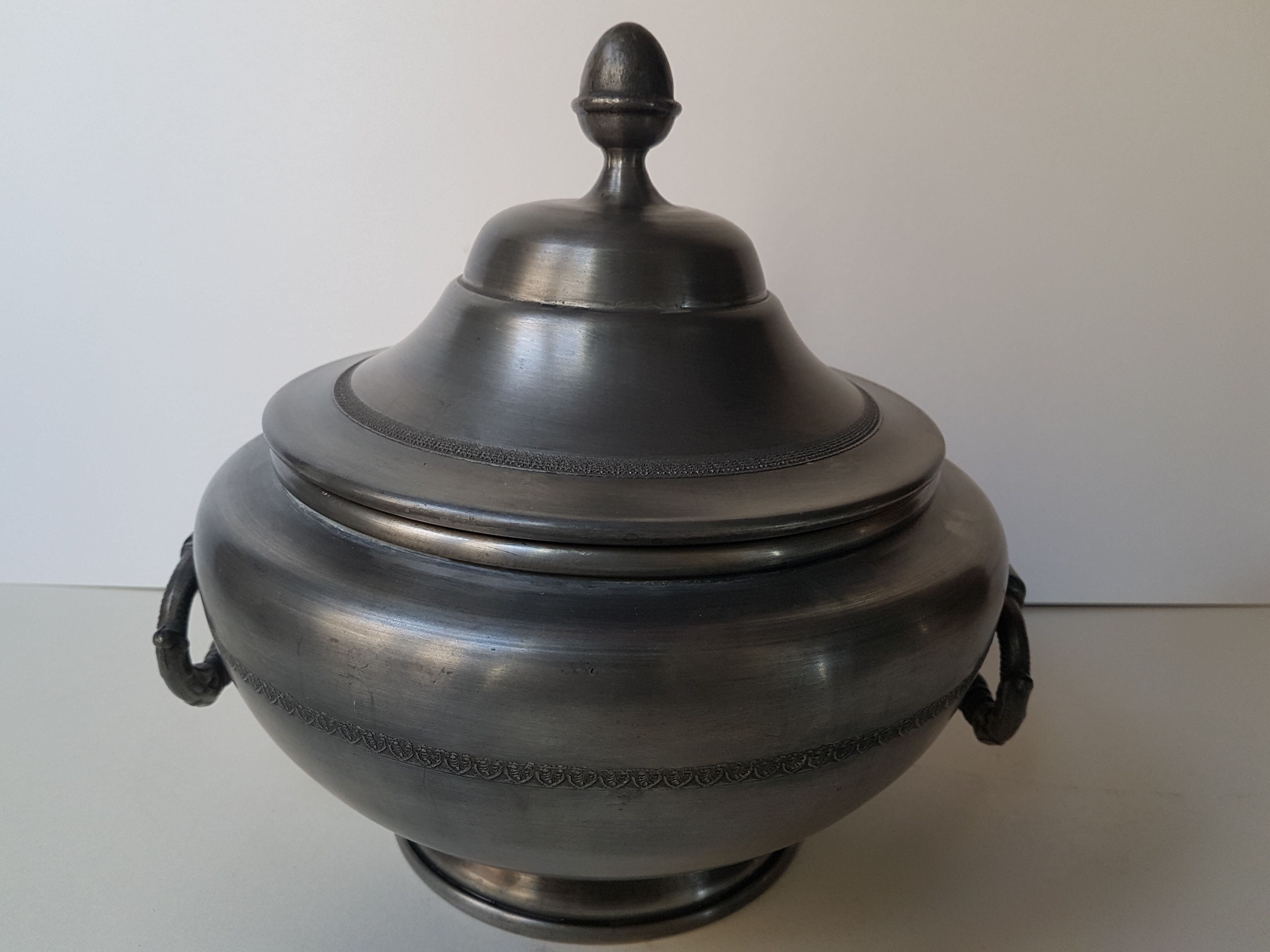 Soup tureen on a pewter serving dish