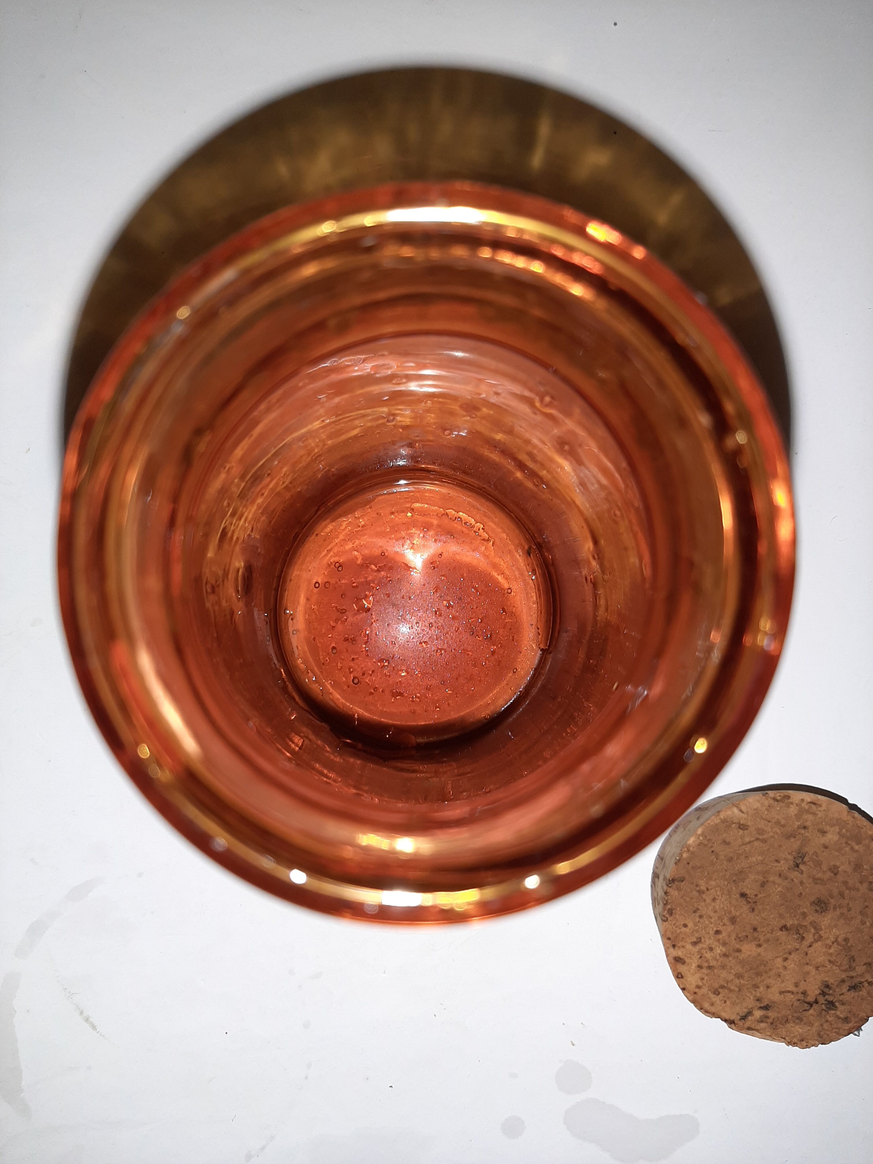 Amber pharmacy bottle made of old bubbled glass