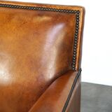 Sleek sheepskin Art Deco design armchair with beautiful details