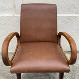 Mid-Century Scandinavian vintage retro armchair with oval armrests.