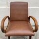 Mid Century Scandinavian vintage retro armchair with oval armrests.