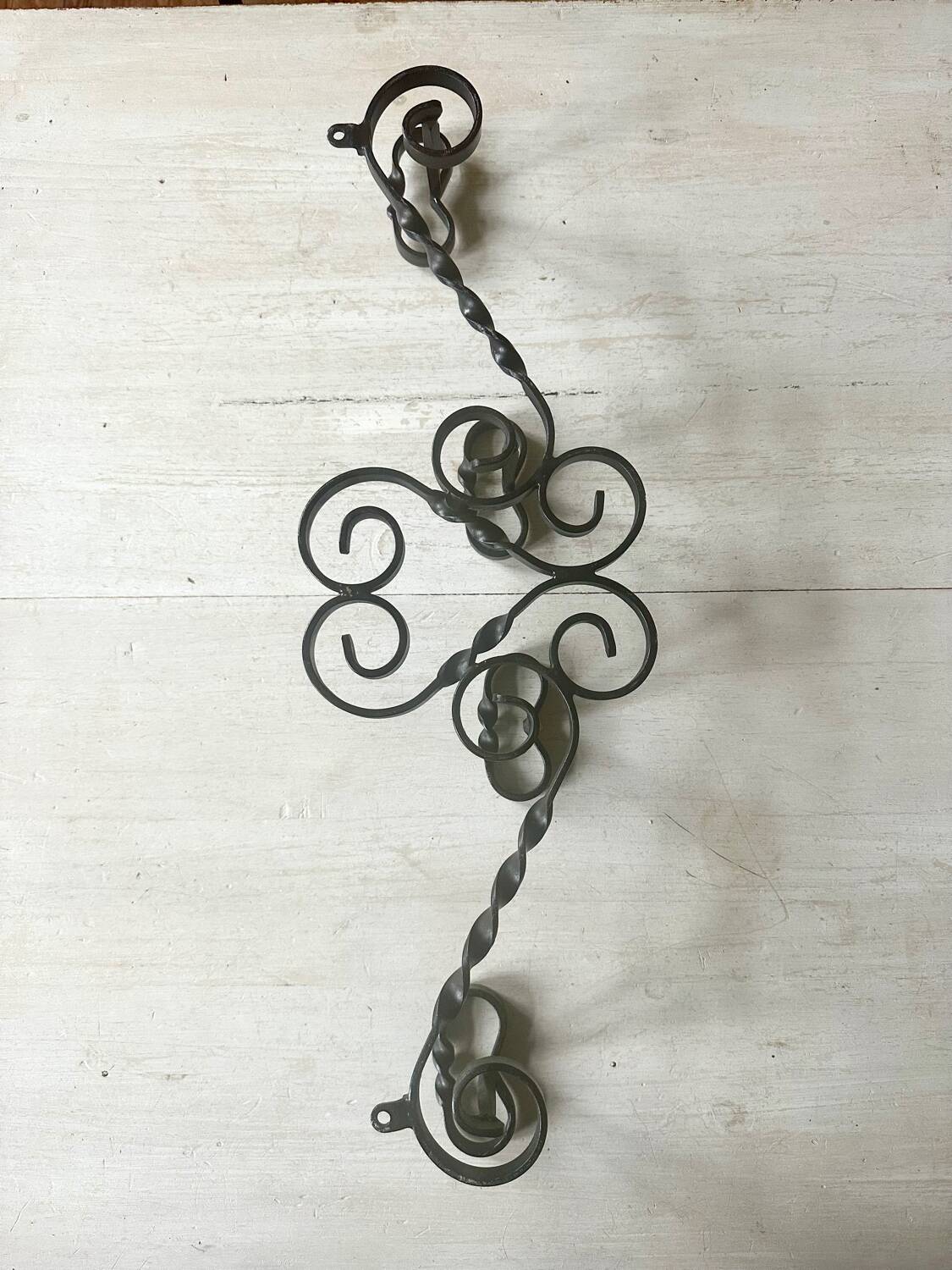 Old wrought iron coat rack