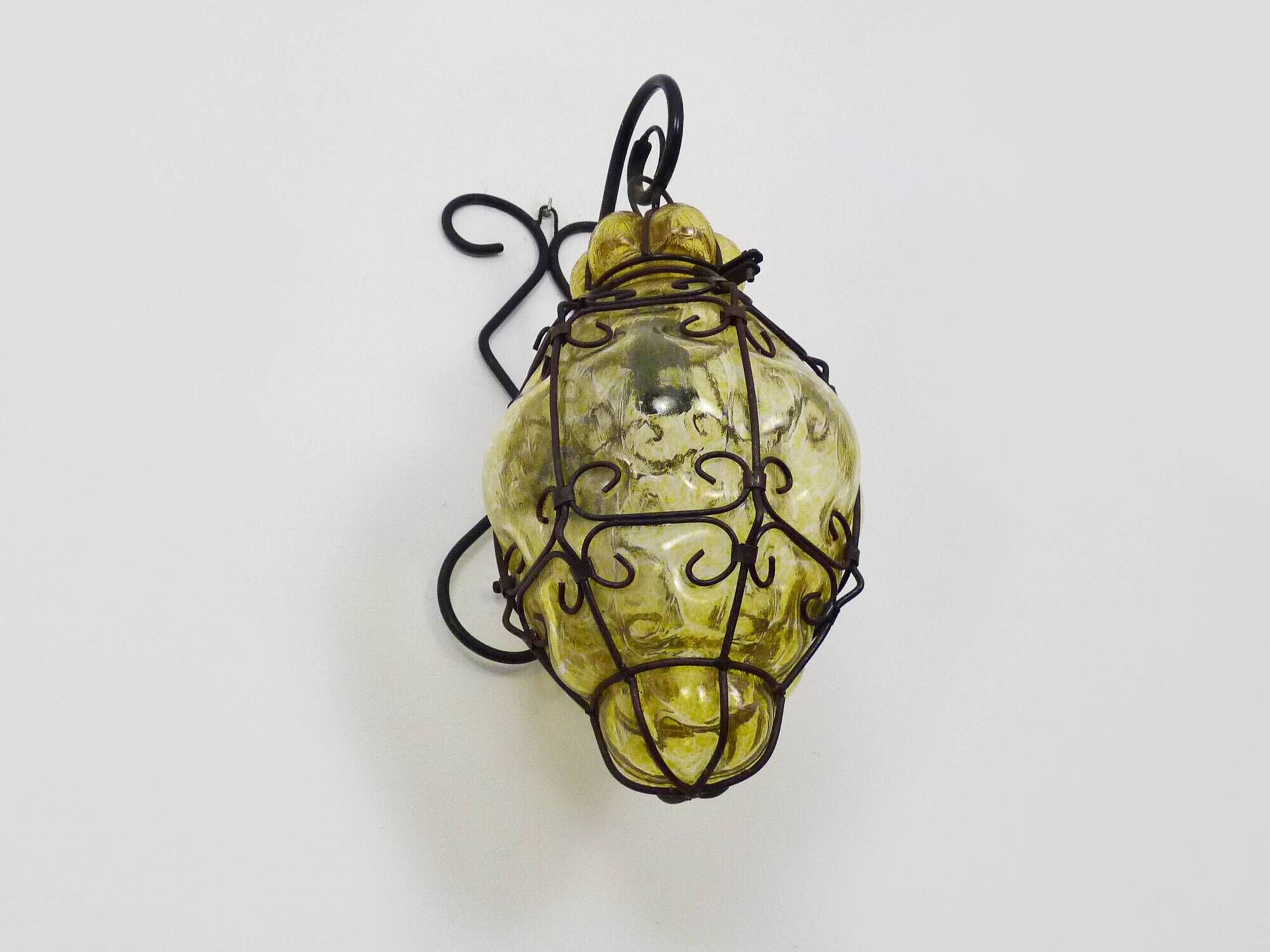 Vintage Italian wall light in transparent yellow blown glass and wrought iron. 70s 80s