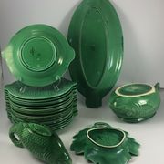 Part of service a fish Sarreguemines 22 pieces in faience green carp