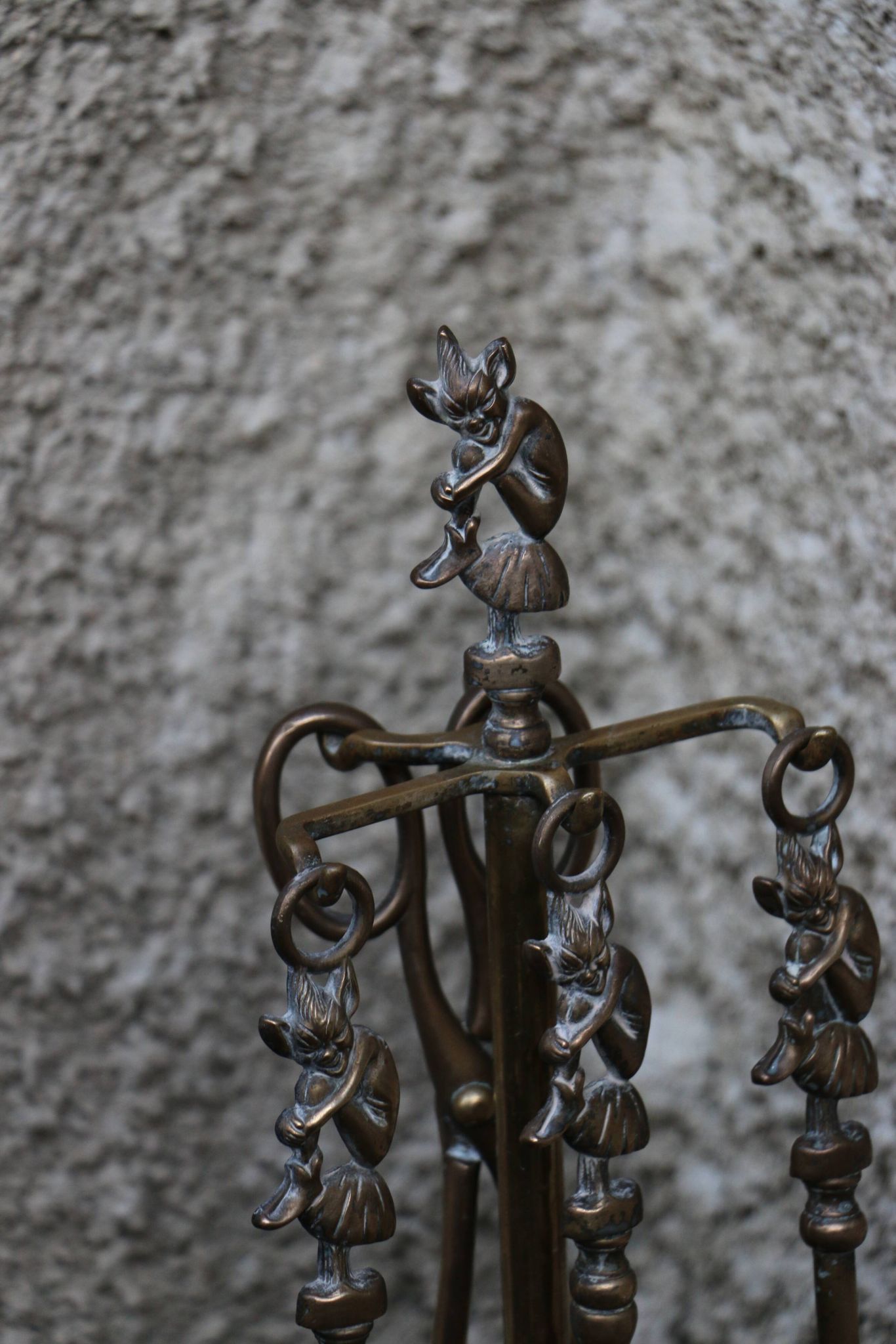 Brass fireplace servant with pair of cast iron pegs with vintage brass ball year 60