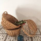 Three natural wicker baskets