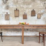 Solid wood workshop table with straight legs.