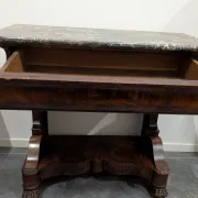 Console restored in flamed mahogany, Sainte-Anne marble, claw feet.