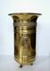 Hollywood Regency style umbrella stand, brass finish and lio pattern.